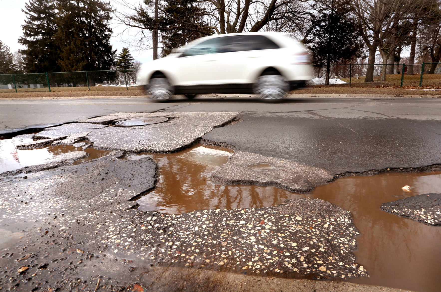 Spring thaw reveals La Crosse's cratered streets